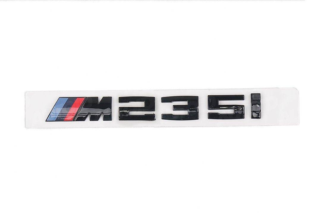 BMW 1 series Gloss black badge ( specify series in notes )